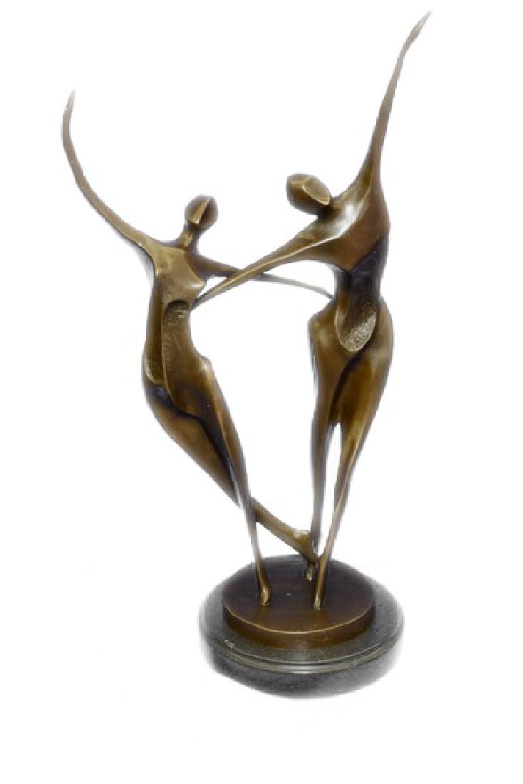 Shall We Dance Bronze Sculpture: This Bronze Sculpture is to be supremely elegant and graceful. Art Deco is a geometry of clean, crisp lines drawn in broad, sweeping gestures. This Sculpture was cast using the Lost Wax Method and has