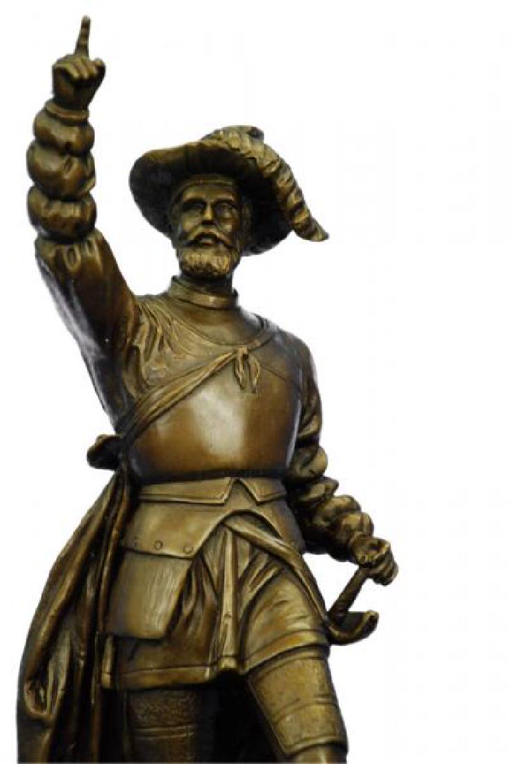 Spanish Conquistador and Explorer Vasco Bronze: The handmade bronze sculpture was cast using the archaic method of lost wax casting and stained with a brown patina finish for perpetuation. He is mounted upon a marble base. Bronze Dimensions with Ma