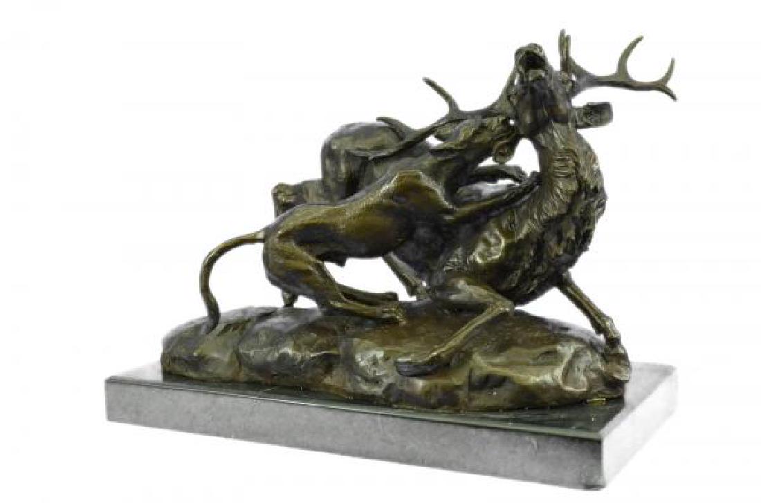 Lion Attacking Moose Bronze Sculpture (1 of 7)