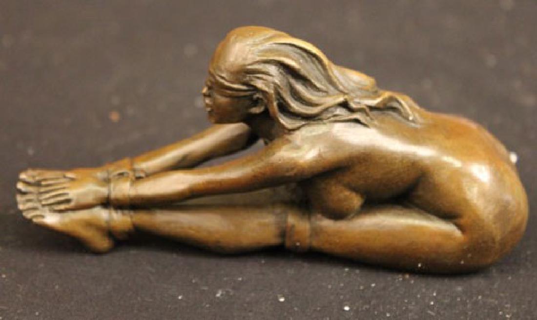 Erotic Nude Art Bronze Sculpture: Lovers play a wicked sexy game. She lets him blindfold her and bind her legs, ankles and wrists. Her long body folds over her tied legs. She happily surrenders to his will. She has a full figure with 