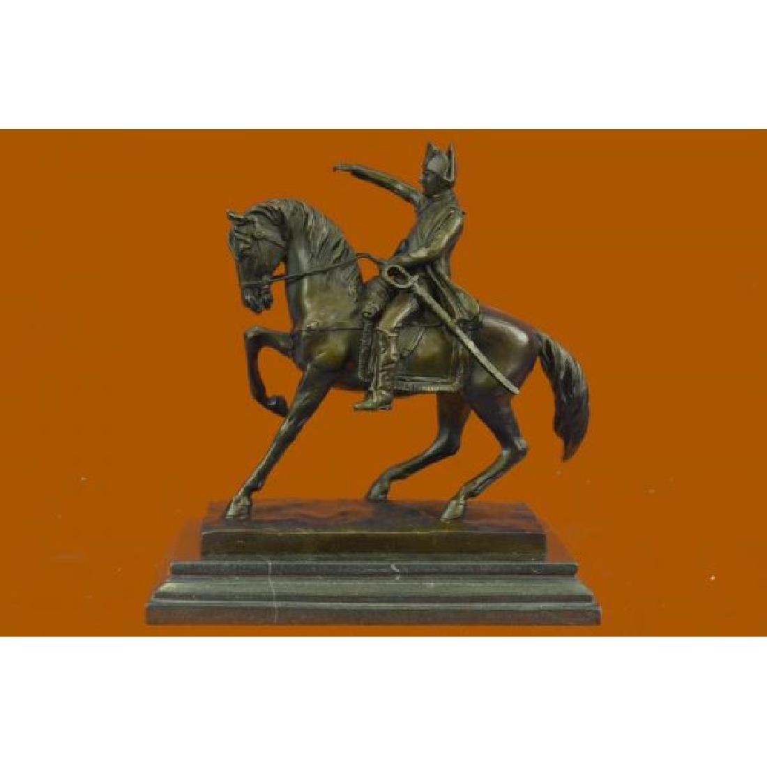 Napoleon French Emperor Bronze Sculpture: Napoleon Crossing the Alps also known as Napoleon at the Saint Bernard Pass or Bonaparte Crossing the Alps is the title given to five versions of an oil on canvas equestrian portrait painted by the Fr