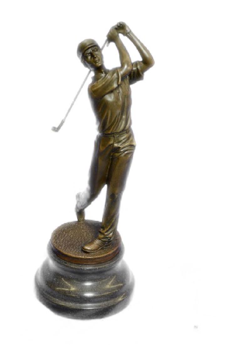 Golfer Sport Memorabilia Bronze Sculpture: A golfer tilts her head up to the sun and watches her ball rise. She holds her form and stance, tracking the position of the ball and how close to the green it may land. Her body twists with her strok