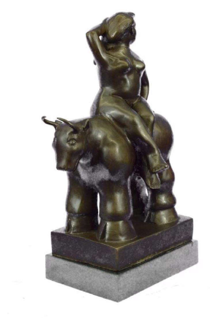 Fernando Botero Abstract Mid Century Nude Girl With:  ; This proportionally exaggerated bronze sculpture is characteristic of Fernando Botero's abstract and representational style. The bold woman rides on the back of a large bull, plump and confide