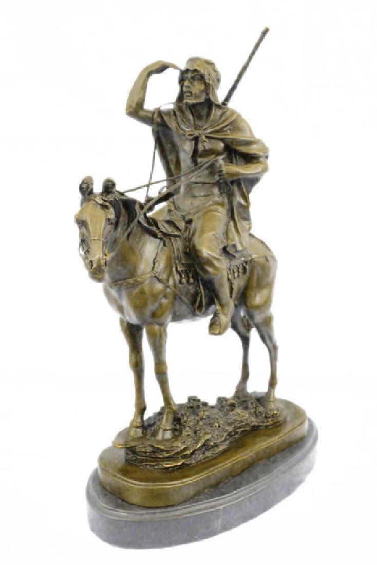 Antoine Barye Arab on Horse Morrocan Hunter Statue Deco: This sculpture features a man in traditional Arabian garb riding a horse through the desert searching for an oasis. He holds his hand up to shield the torturous sun as his eyes loose and find somethin