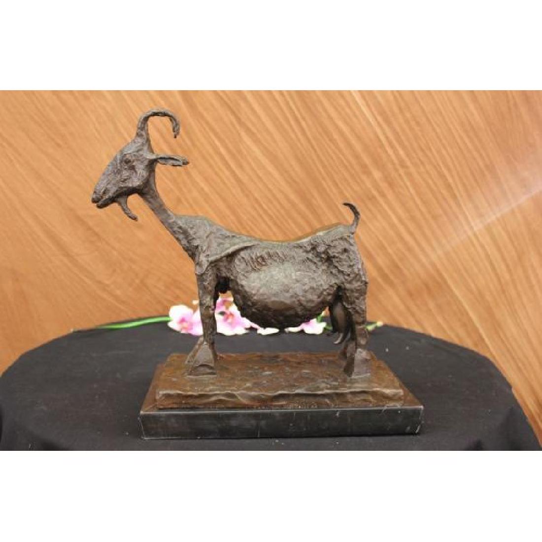 Stunning Picaso Dali Gia Abstract Farm Animal Goat: She Goat was one of the creative pieces constructed using old and discarded materials that could be used to suggest parts of the animals body. A wicker basket as rib cage, jugs as udders, palm fronds 