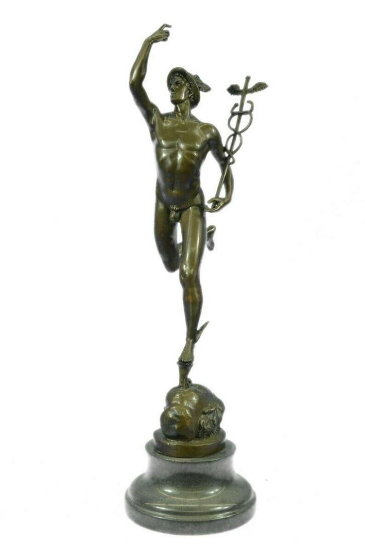 Roman Flying Mercury Bronze Figure: He is depicted wearing a winged Pegasus on his head and winged sandals which give him speed in flight. He carries the caduceus in his hand, the staff was given to him by Apollo that has come to symbol