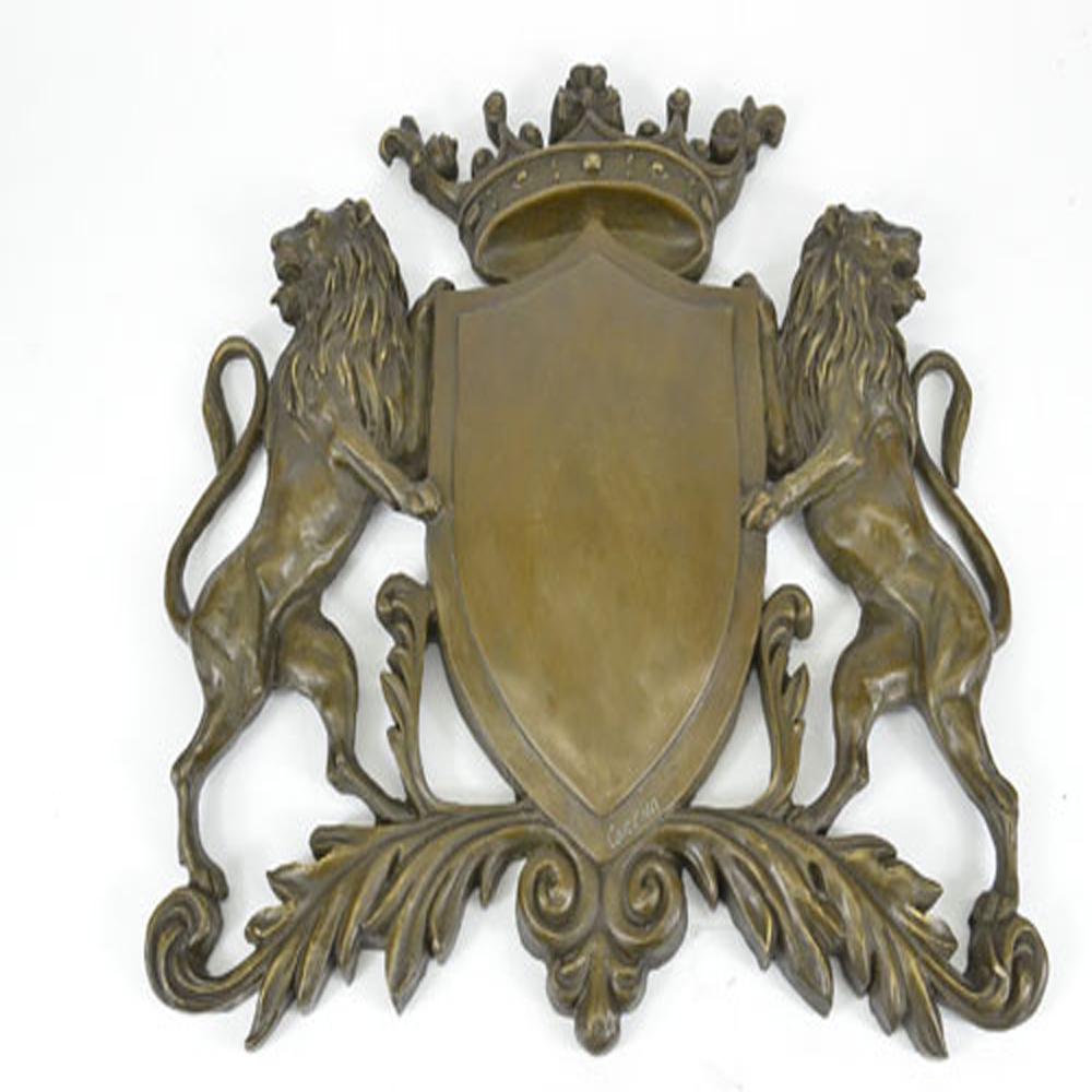 Lion Crest Family Heirloom Bronze Sculpture: This amazing piece that would go lovely as a family traditional crest describes the power behind a shield and two lions, they were used as a way of protection from all weapons, enemies, evil, etc. The
