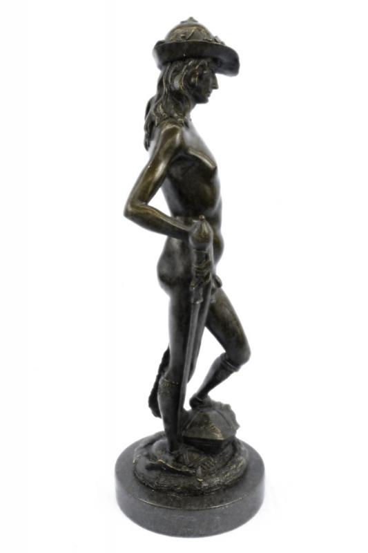 Nude Male Bronze Sculpture: The youth is completely naked, apart from a laurel-topped hat and boots, bearing the sword of Goliath. The sculpture was cast using the age-old method of lost-wax casting and stained with a brown pati