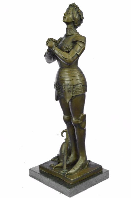 Saint Joan of Arc Bronze Marble Sculpture: Saint Joan of Arc or The Maid of Orl\'e9ans was a peasant girl born in eastern France who claimed divine guidance lit her path. Visions from God instructed her to recover her homeland from English dom