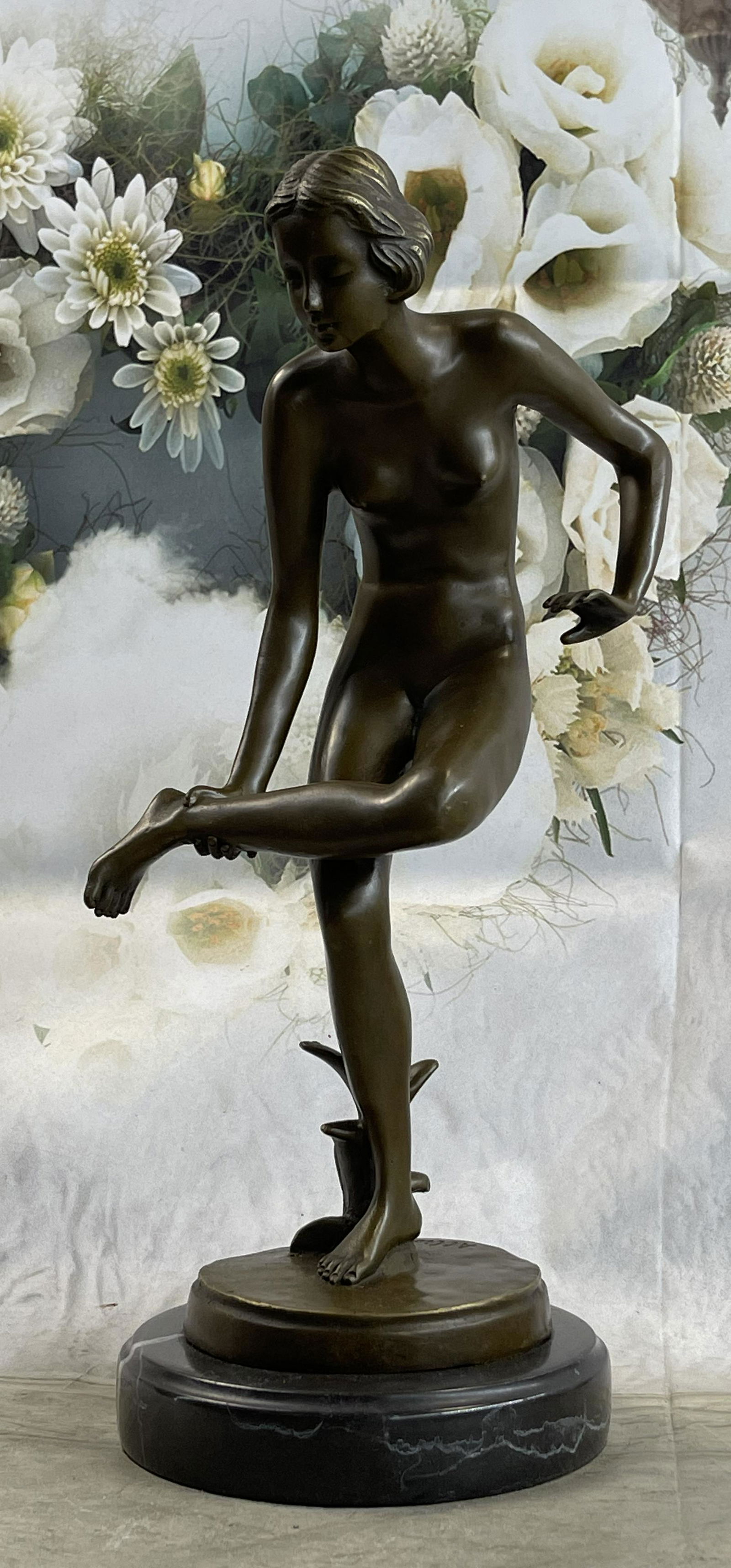 Nude Girl Bronze Statue: A stunning creation with exquisite detail cast by the traditional lost wax or hot cast method this sculpture is mounted on marble. Dimensions: Height 16 X Width 6 inches. Weight: 12 LBS.