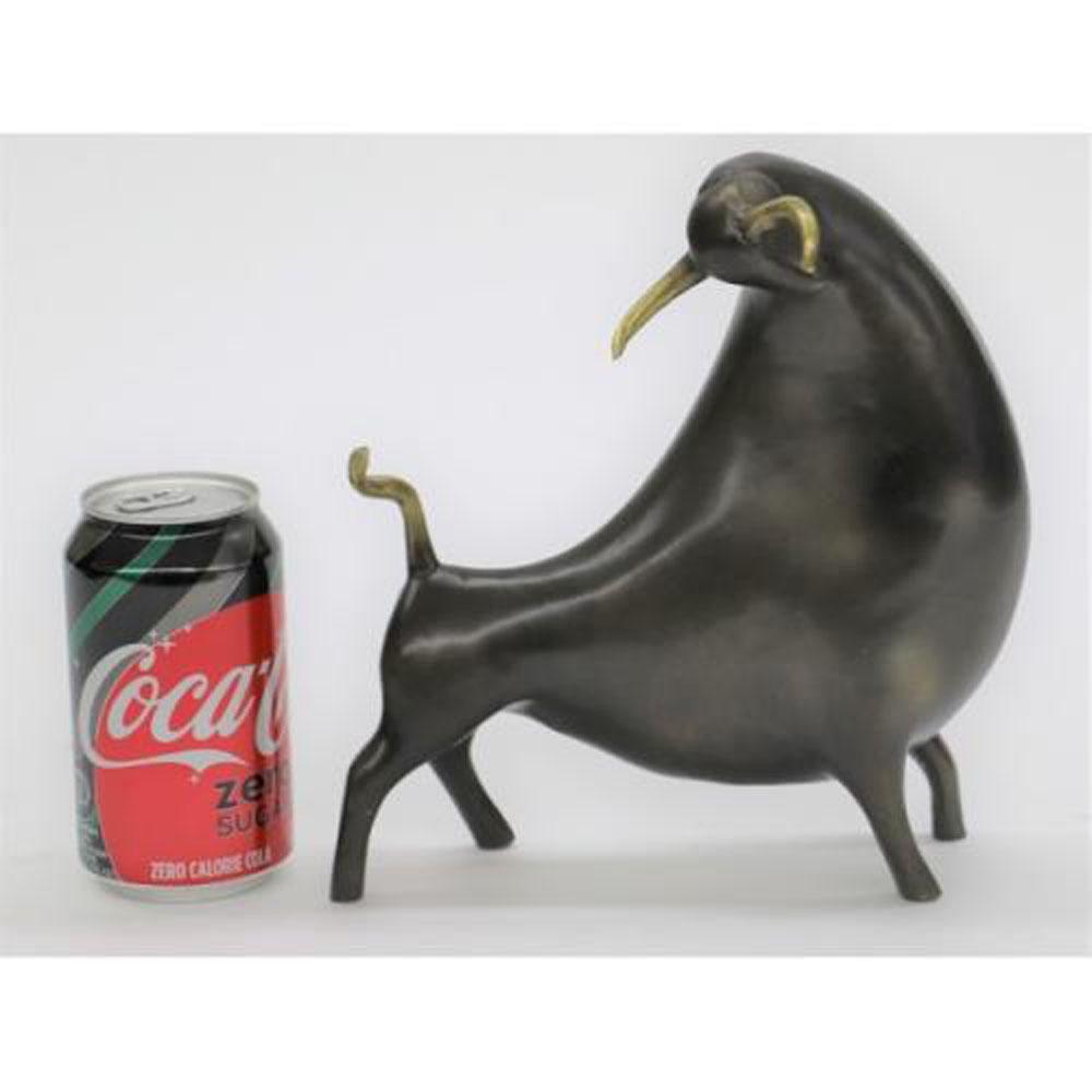 Animal Edition Bull Bronze Sculpture: This is an Animal Bronze Sculpture the Modern Art slim abstract Bull. This Sculpture is an absolute great artwork with a motive full of strength and fighting spirit which the bull can always use to wi