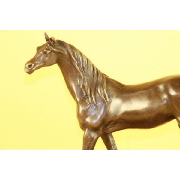 Arabian Horse Bronze Sculpture: The attention to the intricate details of these luxurious works of art is amazing and the brilliance of the figures is unsurpassed. This gorgeous mare takes a stroll through the luscious green fields 