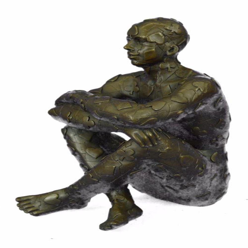 Man with Poker Outfit Bronze Sculpture: This abstract is a very odd and creative one, I guarantee you that you will have people talking about it. You can tell it is a figure of a man sitting wearing a poker design outfit, but the conversati