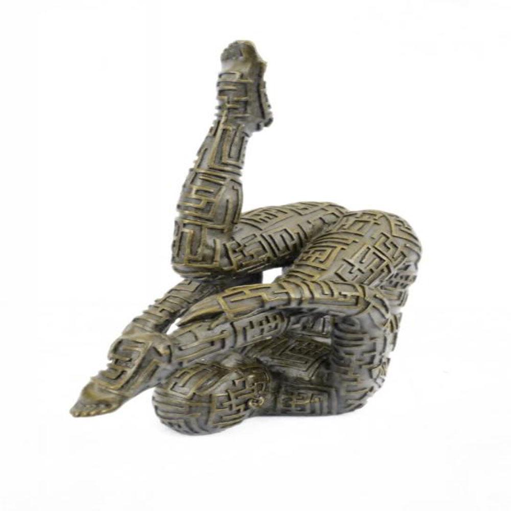 Yoga Exercise Bronze Sculpture: This abstract is a very odd and creative one, I guarantee you that you will have people talking about it. You can tell it is a figure of a man suspended in the air wearing an unusual design outfit, bu