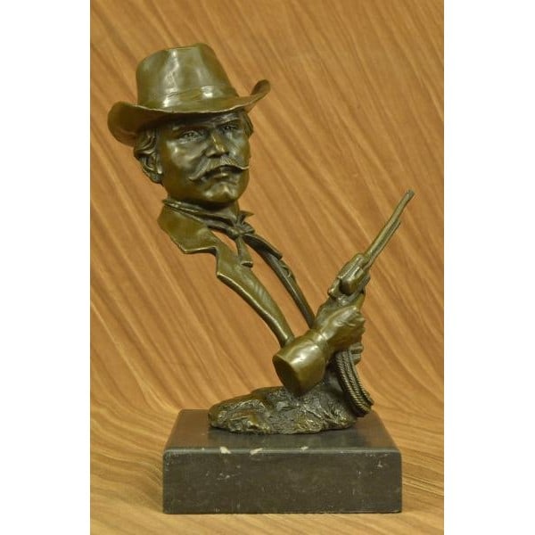Gun Revolver Wyatt Earp Western Bronze Statue: Timothy Trask has skillfully crafted possibly the finest and most accurate representation of Wyatt Earp ever produced. Close attention to intricate detail brings Wyatt Earp back to life on that infamo