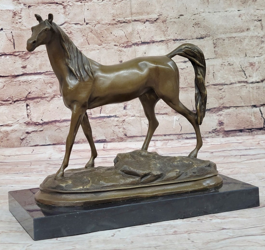 Arabian Horse Bronze Sculpture: The attention to the intricate details of these luxurious works of art is amazing and the brilliance of the figures is unsurpassed. This gorgeous mare takes a stroll through the luscious green fields 