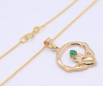 Attractive Yellow Gold Emerald Claddagh Pendant on Chain