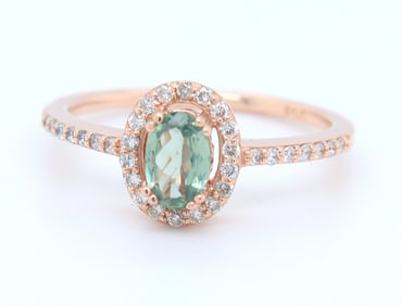 Charming Rose Gold oval Green Spinel in Diamond Halo Ring