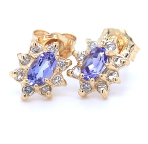 14kt Yellow gold oval Tanzanite and diamond flower earrings