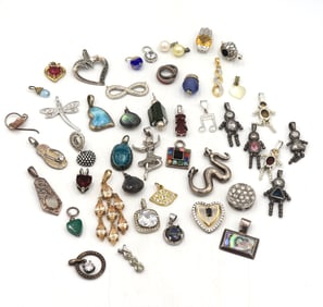 Group lot of vintage 925 sterling silver pendants and charms