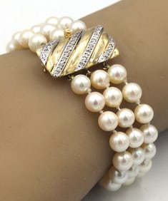 Triple row pearl diamond clasp bracelet in 14kt Yellow gold