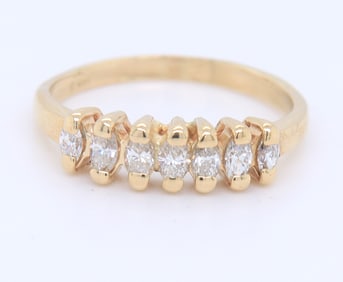 Dazzling Yellow Gold Marquise Seven Diamond Band
