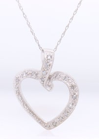 10kt White gold diamond heart shaped pendant on chain necklace