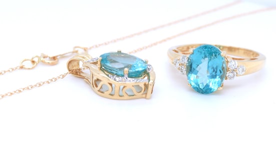 Set of oval quartz and diamond pendant on chain with matching ring