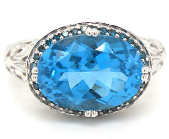 14kt White gold oval blue topaz cocktail ring