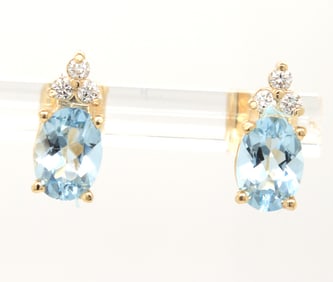 14kt Yellow gold 1.50ctw Aquamarine and diamond accent earrings