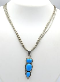 925 Sterling silver signed turquoise pendant on multi strand necklace