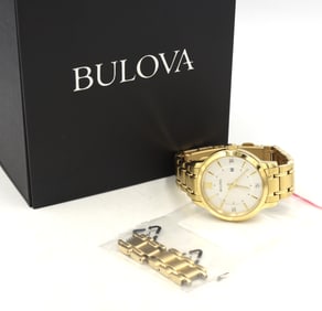 Bulova gold tone quartz round  watch