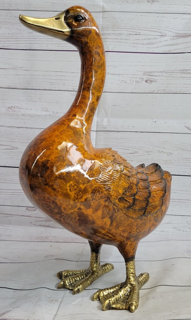 Duck Bird Bronze Sculpture: This Bronze Sculpture was produced using the Lost Wax casting method. The Lost Wax Cast method is the most precise metal casting technique in existence, ensuring exquisite detail of the original host 