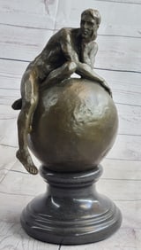 Nude Male Resting on Top of the World Bronze Sculpture