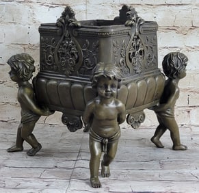 Four Identical Boy Planter Bronze Sculpture
