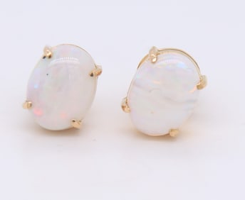 Pleasing Yellow Gold oval Opal Stud Earrings