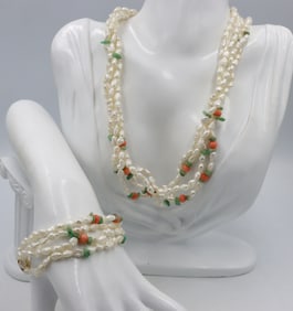 Set of pearl, jade and coral beaded multi strand necklace and bracelet