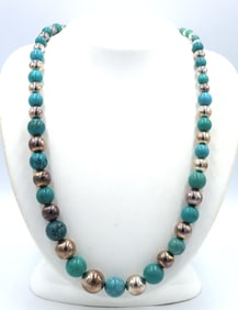 Turquoise and silver beaded necklace