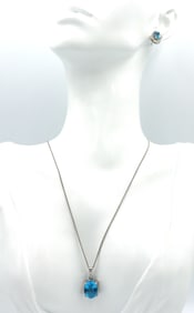 Set of 925 sterling silver blue zirconia pendant on chain and earrings