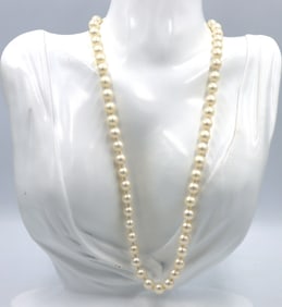 White fresh water pearl necklace with gold clasp