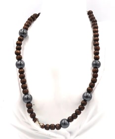 Wooden beads necklace with silver clasp