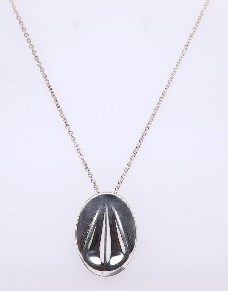 Tiffany & Co Elsa Peretti Zodiac Libra Necklace: 925 Sterling Silver Tiffany & Co Elsa Peretti Zodiac Libra Pendant on 27 inches Chain Necklace. Total weight of Necklace 14 Grams.