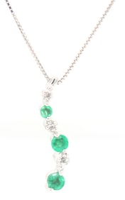 10kt White gold Emerald and diamond accent pendant on chain