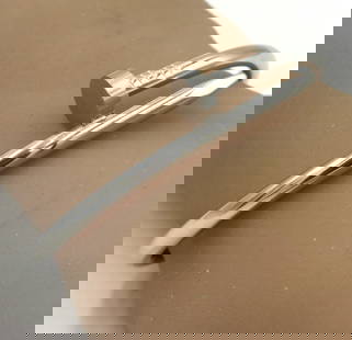 Stainless steel nail cuff bangle: Stylish Stainless steel nail cuff bangle. The total weight of the bangle is 22.2 grams.