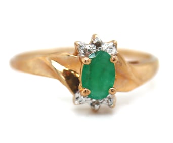 10kt Yellow gold oval emerald and diamond ring