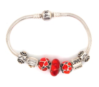 925 Sterling silver Pandora bracelet with 7 charms