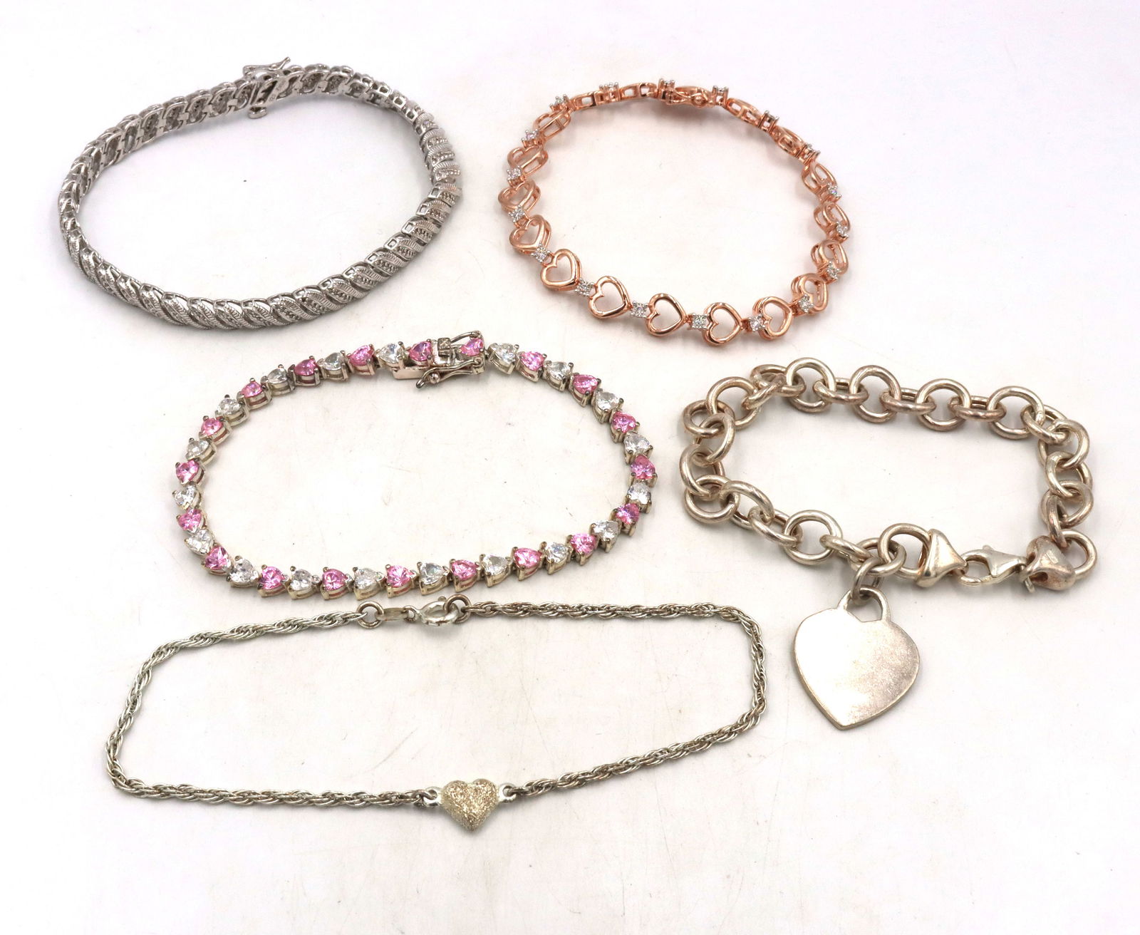 Group lot of 5 Vintage 925 sterling silver bracelets: Group lot of 5 Vintage 925 sterling silver bracelets. The total weight of the lot is 58.5 grams.
