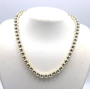 925 Sterling silver ball beaded necklace: 925 Sterling silver ball beaded 16-inch necklace with lobster clasp. The total weight of the chain is 49.9 grams.