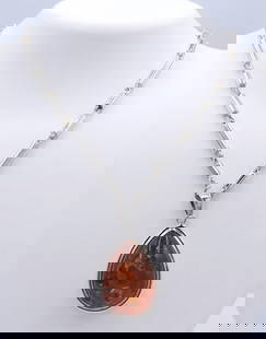 925 Sterling Silver Amber Pendant on Chain Necklace: 925 Sterling Silver Amber Pendant on 24 inches Chain Necklace. Total weight of Necklace 38 Grams.