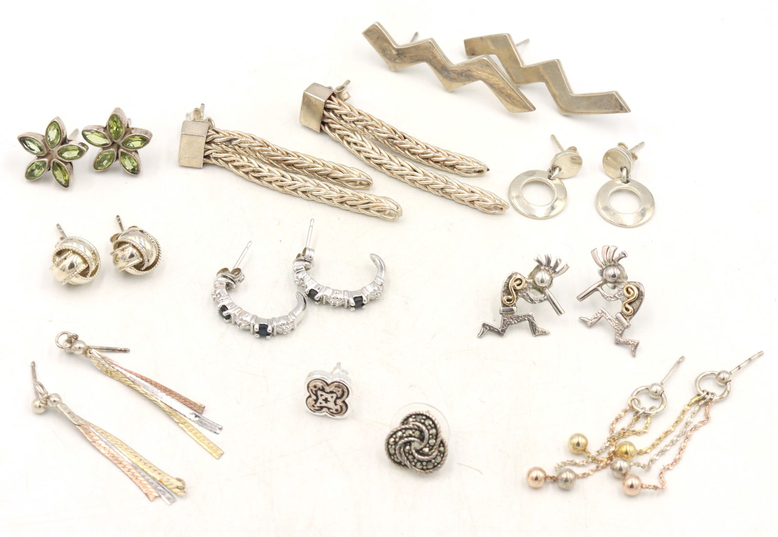 Group lot of Vintage 925 sterling silver earrings: Group lot of Vintage 925 sterling silver earrings. Total weight of lot is 47.8 grams.